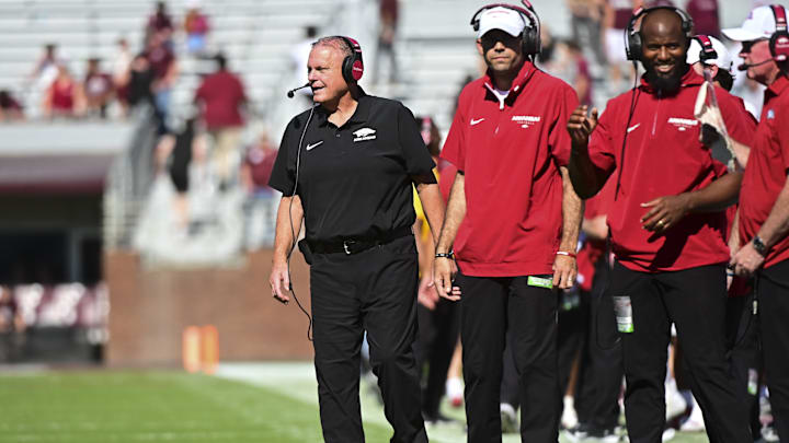 Oct 26, 2024; Starkville, Mississippi, USA; Arkansas Razorbacks head coach Sam Pittman stands on the field after a play during the third quarter of the game against the Mississippi State Bulldogs at Davis Wade Stadium at Scott Field. Mandatory Credit: Matt Bush-Imagn Images