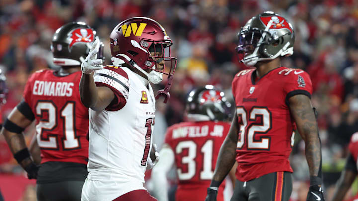 Washington Commanders wide receiver Terry McLaurin reacts after catching a touchdown.