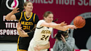 Iowa City Regina's Addie McLaughlin passes the ball during the IGHSAU state basketball tournament at Wells Fargo Arena on Wednesday, March 5, 2025, in Des Moines.