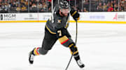 Mar 23, 2025; Las Vegas, Nevada, USA; Vegas Golden Knights defenseman Alex Pietrangelo (7) shoots against the Tampa Bay Lightning during the second period at T-Mobile Arena. Mandatory Credit: Stephen R. Sylvanie-Imagn Images