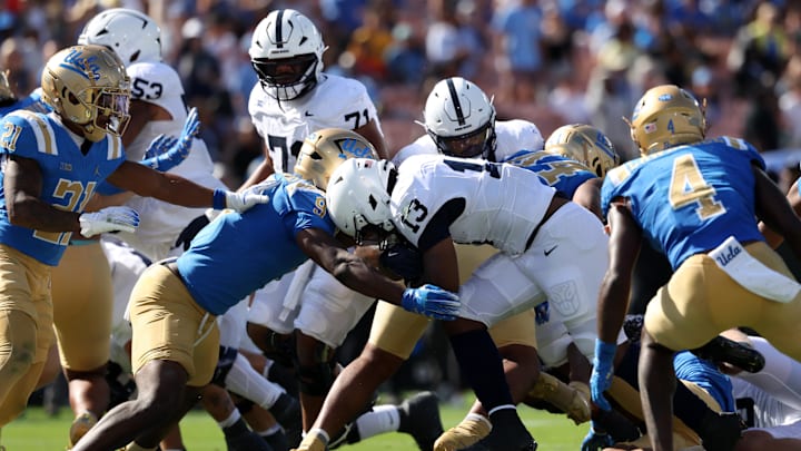 Penn State football running back Kaytron Allen scores a touchdown during the fourth quarter against UCLA