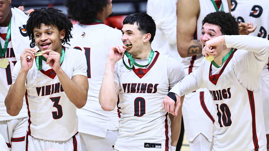 Princeton players Rognny Santiago Lugo, Sabastian Jordan Ramos and Kenny Pope celebrate after their OHSAA DI state championship win over Hilliard Bradley Sunday, March 22, 2026.