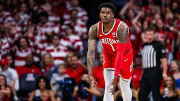 Feb 22, 2025; Tucson, Arizona, USA; Arizona Wildcats guard Caleb Love (1) holds out a three after he makes a three-point basket during the first half against the BYU Cougars at McKale Center. Mandatory Credit: Aryanna Frank-Imagn Images