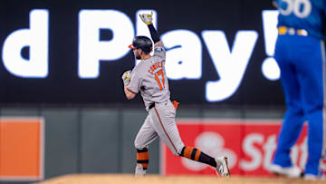 Sep 27, 2024; Minneapolis, Minnesota, USA; Baltimore Orioles left fielder Colton Cowser (17) hits a home run off Minnesota Twins pitcher Caleb Thielbar (56) in the sixth inning at Target Field. Mandatory Credit: Matt Blewett-Imagn Images