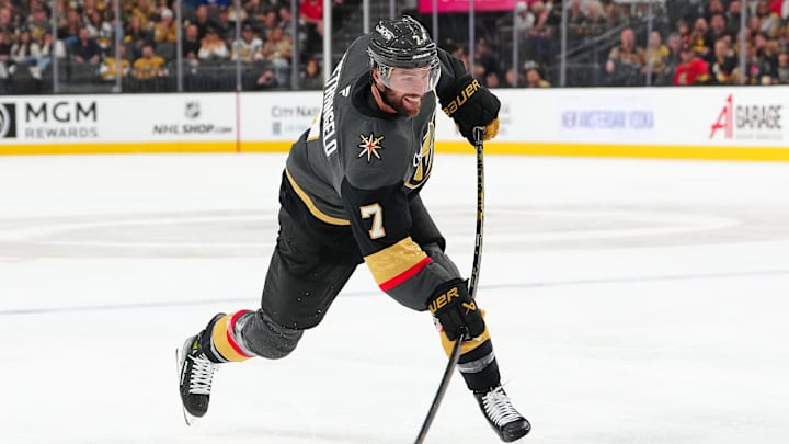 Mar 23, 2025; Las Vegas, Nevada, USA; Vegas Golden Knights defenseman Alex Pietrangelo (7) shoots against the Tampa Bay Lightning during the second period at T-Mobile Arena. Mandatory Credit: Stephen R. Sylvanie-Imagn Images