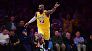 Apr 3, 2025; Los Angeles, California, USA; Los Angeles Lakers forward LeBron James (23) reacts after scoring a basket against the Golden State Warriors during the second half at Crypto.com Arena. Mandatory Credit: Gary A. Vasquez-Imagn Images