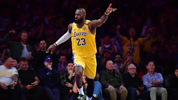 Apr 3, 2025; Los Angeles, California, USA; Los Angeles Lakers forward LeBron James (23) reacts after scoring a basket against the Golden State Warriors during the second half at Crypto.com Arena. Mandatory Credit: Gary A. Vasquez-Imagn Images
