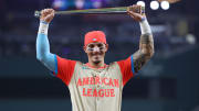 American League left fielder Jarren Duran of the Boston Red Sox celebrates with the MVP trophy after the 2024 MLB All-Star Game.