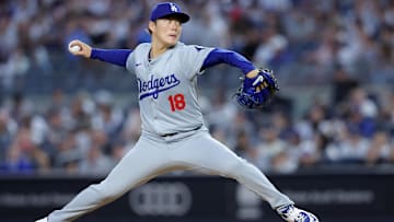 Jun 7, 2024; Bronx, New York, USA; Los Angeles Dodgers starting pitcher Yoshinobu Yamamoto (18) pitches against the New York Yankees during the fifth inning at Yankee Stadium. Mandatory Credit: Brad Penner-USA TODAY Sports