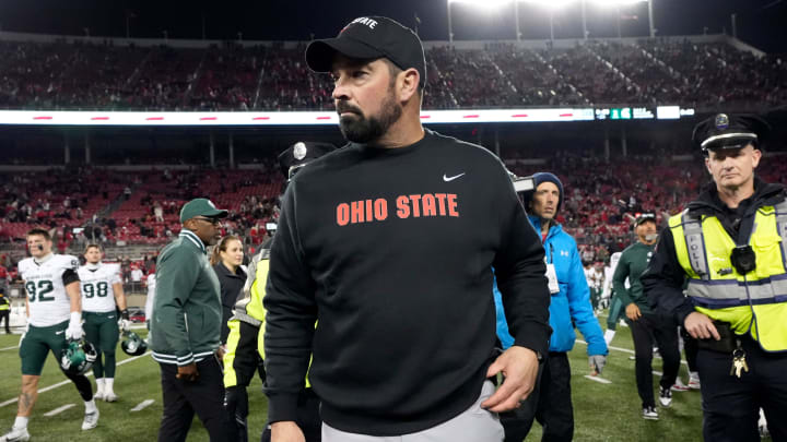 Nov. 11, 2023; Columbus, Oh., USA; 
Ohio State Buckeyes head coach Ryan Day waits to be interviewed at midfield following a 38-3 win in Saturday's NCAA Division I football game against the Michigan State Spartans at Ohio Stadium.