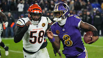 Bengals Joseph Ossai (58) rushes Ravens Lamar Jackson (8) during their game at M&T Bank Stadium on Thanksgiving Thursday November 27, 2025. The Bengals won the game with a final score of 33-14.