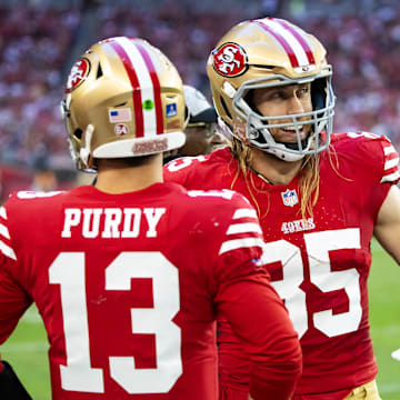 Dec 17, 2023; Glendale, Arizona, USA; San Francisco 49ers tight end George Kittle (85) with quarterback Brock Purdy (13) against the Arizona Cardinals at State Farm Stadium. Mandatory Credit: Mark J. Rebilas-USA TODAY Sports