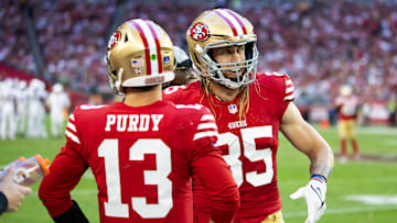 Dec 17, 2023; Glendale, Arizona, USA; San Francisco 49ers tight end George Kittle (85) with quarterback Brock Purdy (13) against the Arizona Cardinals at State Farm Stadium. Mandatory Credit: Mark J. Rebilas-USA TODAY Sports