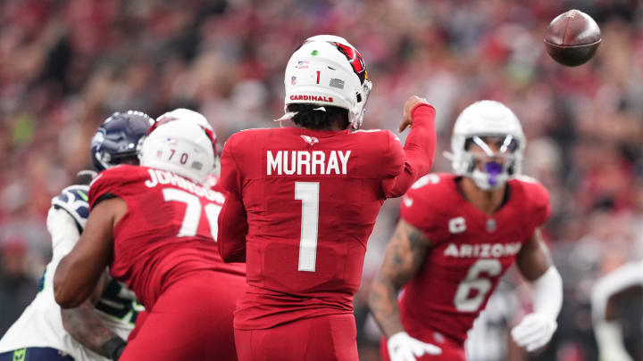 Jan 7, 2024; Glendale, Arizona, USA; Arizona Cardinals quarterback Kyler Murray (1) throws to Arizona Cardinals running back James Conner (6) during the first half against the Seattle Seahawks at State Farm Stadium. Mandatory Credit: Joe Camporeale-USA TODAY Sports