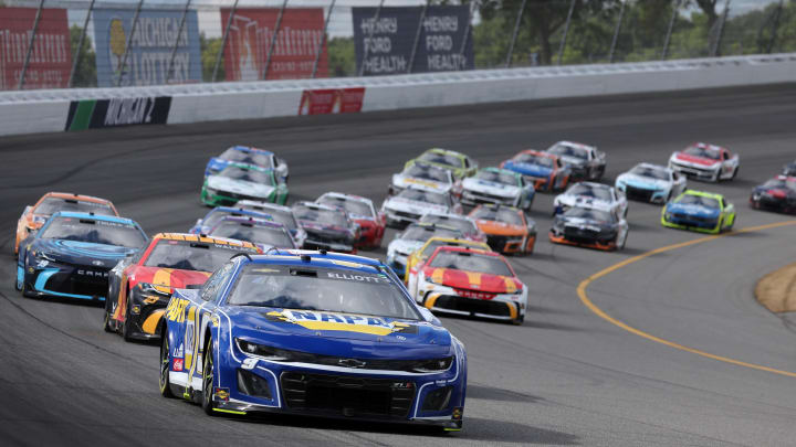 Aug 19, 2024; Brooklyn, Michigan, USA; NASCAR Cup Series driver Chase Elliott (9) leads the field during the FireKeepers 400 at Michigan International Speedway. 