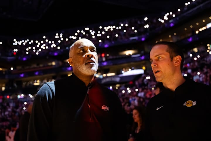 Los Angeles Lakers assistant coach Phil Handy (left) and Jordan Ott against the Phoenix Suns.