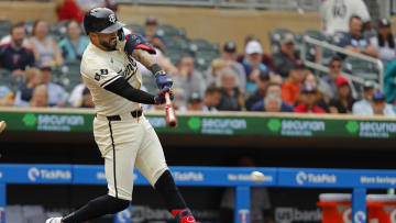 Carlos Correa swings for a hit.