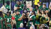 Dec 21, 2023; Boca Raton, FL, USA;  South Florida Bulls offensive lineman Donovan Jennings (73) and