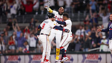Atlanta, Georgia, USA; Atlanta Braves left fielder Alex Verdugo (8) celebrates with designated hitter Marcell Ozuna (20) and second baseman Ozzie Albies (1) after a walk-off single against the Washington Nationals at Truist Park.