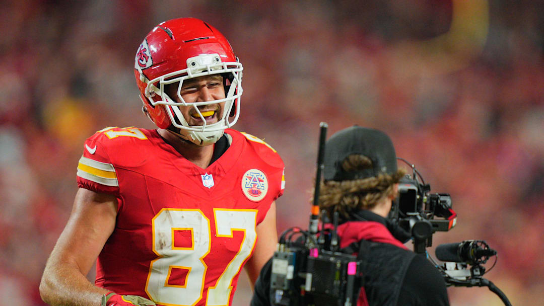 Oct 27, 2025; Kansas City, Missouri, USA; Kansas City Chiefs tight end Travis Kelce (87) celebrates after scoring a touchdown against the Washington Commanders during the third quarter of the game at GEHA Field at Arrowhead Stadium. Mandatory Credit: Jay Biggerstaff-Imagn Images