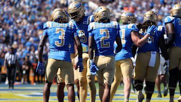 Oct 4, 2025; Pasadena, California, USA;  UCLA Bruins wide receiver Kwazi Gilmer (3) celebrates with quarterback Nico Iamaleava (9) after scoring a touchdown during the first quarter against the Penn State Nittany Lions at Rose Bowl. Mandatory Credit: Kiyoshi Mio-Imagn Images
