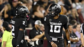 Oct 26, 2024; College Station, Texas, USA; Texas A&M Aggies quarterback Marcel Reed (10) celebrates after scoring a touchdown in the fourth quarter against the LSU Tigers at Kyle Field. Mandatory Credit: Maria Lysaker-Imagn Images. 
