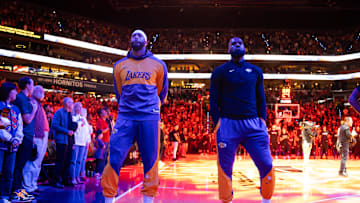 Nov 26, 2024; Phoenix, Arizona, USA; Los Angeles Lakers forward LeBron James (right) and forward Anthony Davis against the Phoenix Suns during an NBA Cup game at Footprint Center. Mandatory Credit: Mark J. Rebilas-Imagn Images