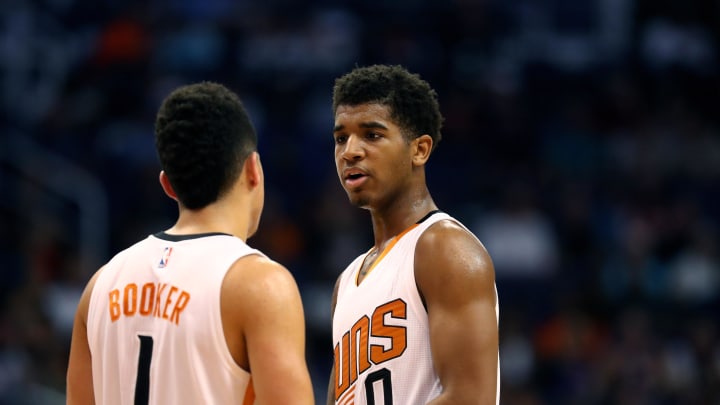 Nov 9, 2016; Phoenix, AZ, USA; Phoenix Suns forward Marquese Chriss (0) and guard Devin Booker (1) against the Detroit Pistons at Talking Stick Resort Arena. Mandatory Credit: Mark J. Rebilas-USA TODAY Sports
