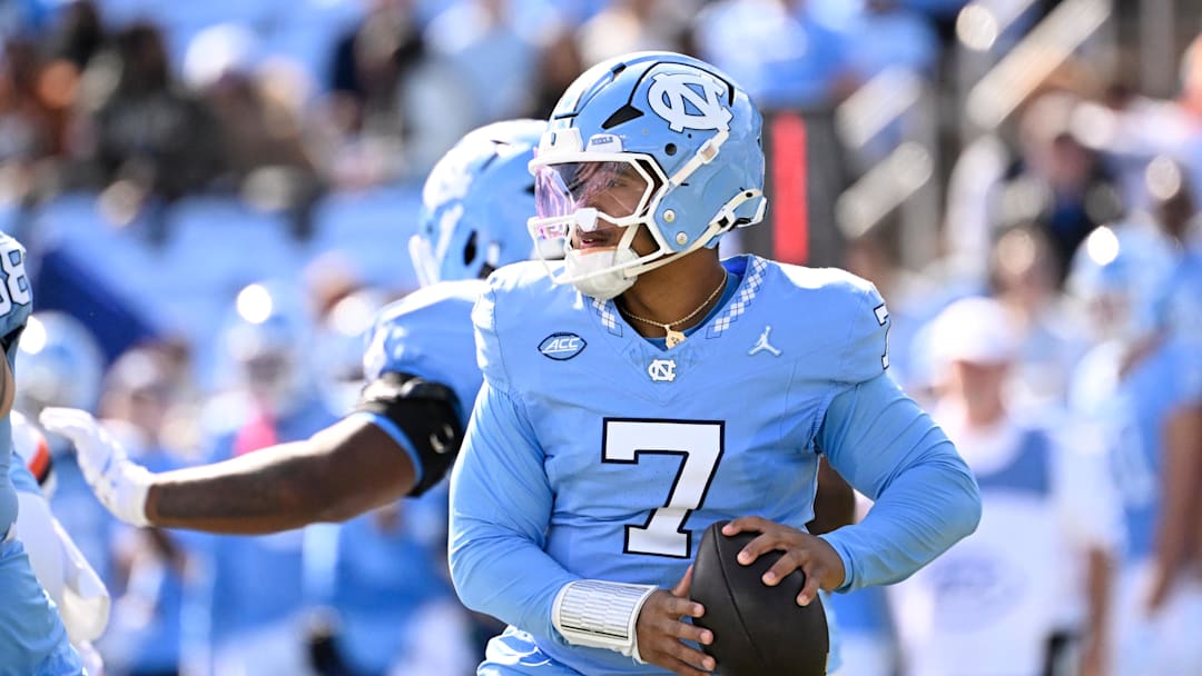 Oct 25, 2025; Chapel Hill, North Carolina, USA; North Carolina Tar Heels quarterback Gio Lopez (7) looks to pass in the first quarter at Kenan Stadium. Mandatory Credit: Bob Donnan-Imagn Images