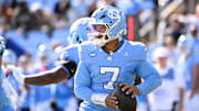 Oct 25, 2025; Chapel Hill, North Carolina, USA; North Carolina Tar Heels quarterback Gio Lopez (7) looks to pass in the first quarter at Kenan Stadium. Mandatory Credit: Bob Donnan-Imagn Images