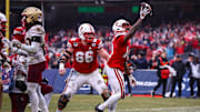 Nebraska running back Rahmir Johnson celebrates after scoring a touchdown in the 2014 Pinstripe Bowl.