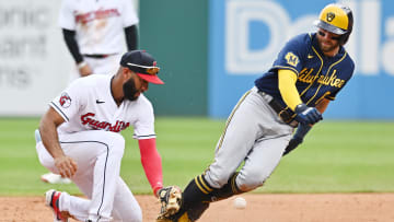 Jun 25, 2023; Cleveland, Ohio, USA; Milwaukee Brewers third baseman Owen Miller (6) is safe at second with an RBI double as Cleveland Guardians shortstop Amed Rosario (1) can not handle the throw during the third inning at Progressive Field. Mandatory Credit: Ken Blaze-USA TODAY Sports