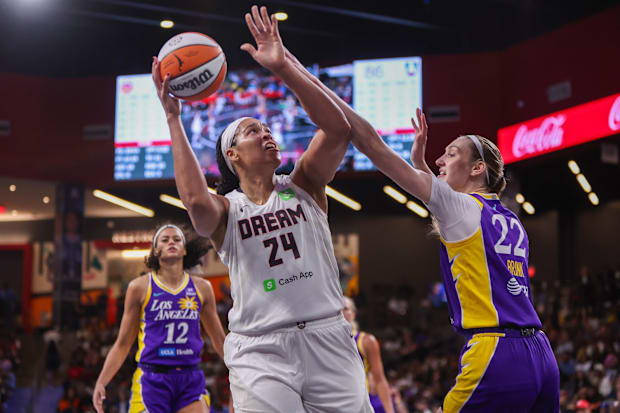 Atlanta Dream forward Brionna Jones (24) shoots over Los Angeles Sparks forward Cameron Brink (22)