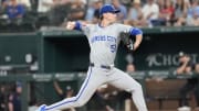 Jun 21, 2024; Arlington, Texas, USA; Kansas City Royals starting pitcher Brady Singer (51) delivers a pitch to the Texas Rangers during the fourth inning at Globe Life Field. 