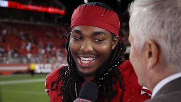 Sep 9, 2024; Santa Clara, California, USA; San Francisco 49ers running back Jordan Mason (24) talks with ESPN's John Sutcliffe on Monday Night Football after the win against the New York Jets at Levi's Stadium. Mandatory Credit: David Gonzales-Imagn Images