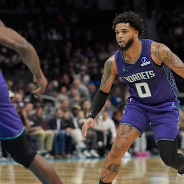 Nov 2, 2025; Charlotte, North Carolina, USA; Charlotte Hornets forward Miles Bridges (0) drives to the basket against the Utah Jazz during the first quarter at Spectrum Center. Mandatory Credit: Jim Dedmon-Imagn Images
