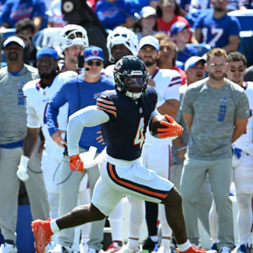 D'Andre Swift breaks a screen pass upfield against Buffalo in the first quarter.