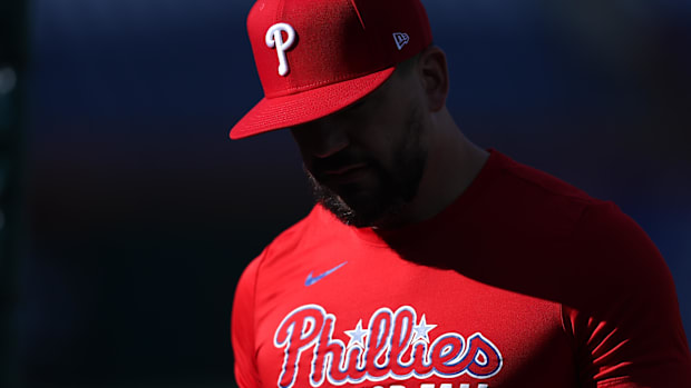 Kyle Schwarber of Philadelphia Phillies in red shirt and red hat