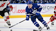 Jan 16, 2025; Toronto, Ontario, CAN;  Toronto Maple Leafs forward Mitch Marner (16) skates with the puck against the New Jersey Devils in the third period at Scotiabank Arena. Mandatory Credit: Dan Hamilton-Imagn Images