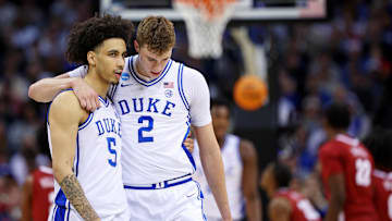 Mar 29, 2025; Newark, NJ, USA; Duke basketball guard Tyrese Proctor (5) talks with forward Cooper Flagg (2) during the second half against the Alabama Crimson Tide in the East Regional final of the 2025 NCAA tournament at Prudential Center.