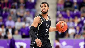 Mar 9, 2024; Fort Worth, Texas, USA; UCF Knights guard Darius Johnson (3) controls the ball during