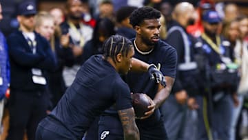 Apr 4, 2025; Boulder, CO, USA; Colorado Buffaloes quarterback Shedeur Sanders (2) runs drills at the University of Colorado NFL Showcase at the CU Indoor Practice Facility. Mandatory Credit: Michael Ciaglo-Imagn Images