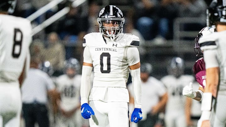 Ankeny Centennial's Malachi Curvey (0) celerbates a stop on the Dowling offense on Friday, Oct. 4, 2024, at Valley Stadium.