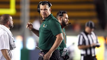 Oct 5, 2024; Berkeley, California, USA; Miami Hurricanes head coach Mario Cristobal walks on the field during the second quarter against the California Golden Bears at California Memorial Stadium.