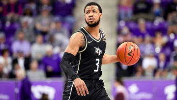 Mar 9, 2024; Fort Worth, Texas, USA; UCF Knights guard Darius Johnson (3) controls the ball during the second half against the TCU Horned Frogs at Ed and Rae Schollmaier Arena. Mandatory Credit: Kevin Jairaj-USA TODAY Sports