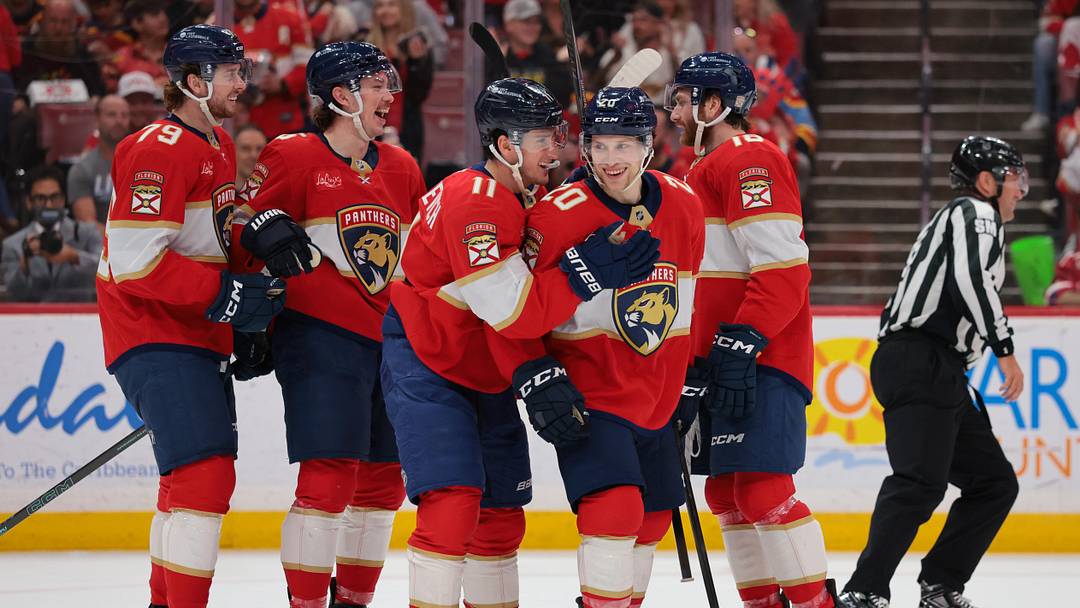 Apr 15, 2026; Sunrise, Florida, USA; Florida Panthers defenseman Mike Benning (20) celebrates with right wing MacKie Samoskevich (11) after scoring against the Detroit Red Wings during the second period at Amerant Bank Arena. Mandatory Credit: Sam Navarro-Imagn Images Apr 15, 2026; Sunrise, Florida, USA; Florida Panthers defenseman Mike Benning (20) celebrates with right wing MacKie Samoskevich (11) after scoring against the Detroit Red Wings during the second period at Amerant Bank Arena. Mandatory Credit: Sam Navarro-Imagn Images