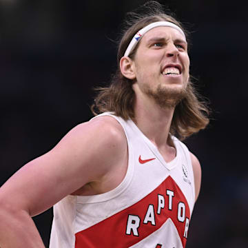 Mar 23, 2024; Washington, District of Columbia, USA;  Toronto Raptors forward Kelly Olynyk (41) reacts during the second half against the Washington Wizards at Capital One Arena. Mandatory Credit: Tommy Gilligan-Imagn Images