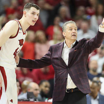 Arkansas Razorbacks head coach Calipari talks to forward Ivisic (44) during the second half against the Missouri Tigers at Bud Walton Arena.