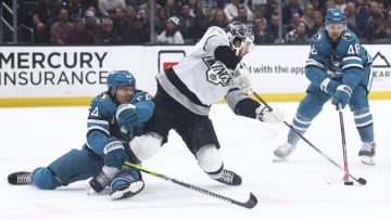 Dec 27, 2023; Los Angeles, California, USA; Los Angeles Kings center Phillip Danault (24) gets