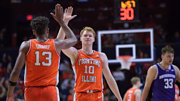 Jan 2, 2024; Champaign, Illinois, USA;  Illinois Fighting Illini forward Quincy Guerrier (13) and